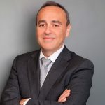 Retrato con traje y corbata de Alejandro Morales Merino Economista en Latorre y Asociados Consultoría